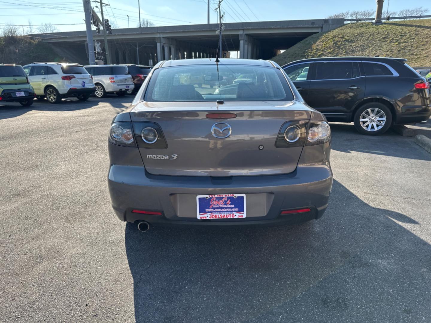 2007 Gray Mazda MAZDA3 s Grand Touring 4-Door (JM1BK323571) with an 2.3L L4 DOHC 16V engine, located at 5700 Curlew Drive, Norfolk, VA, 23502, (757) 455-6330, 36.841885, -76.209412 - Photo#1